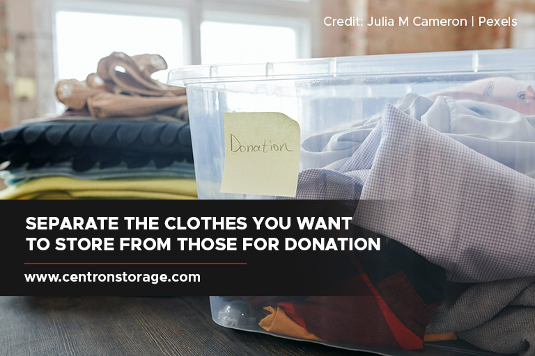 Separate the clothes you want to store from those for donation